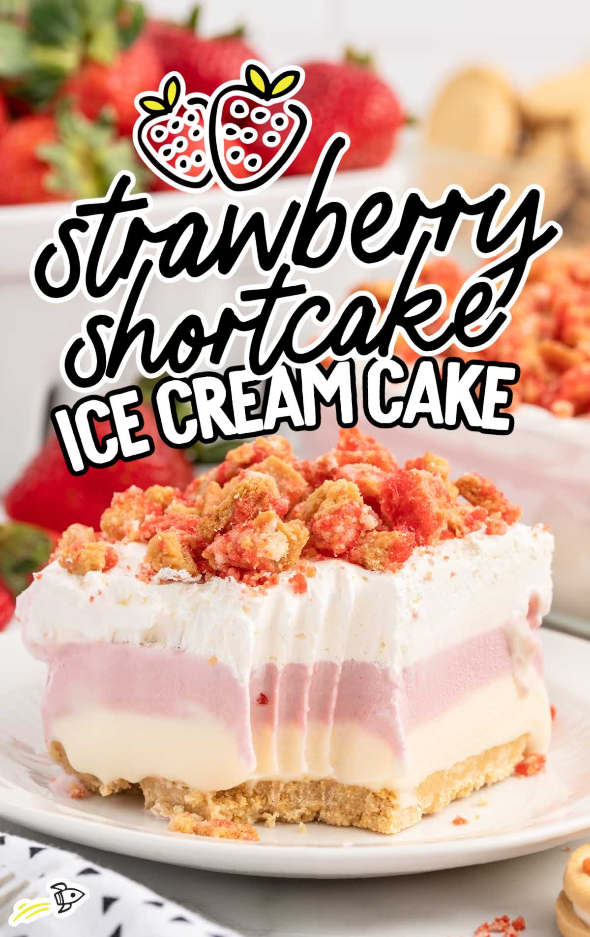 a slice of Strawberry Shortcake Ice Cream Cake on a plate